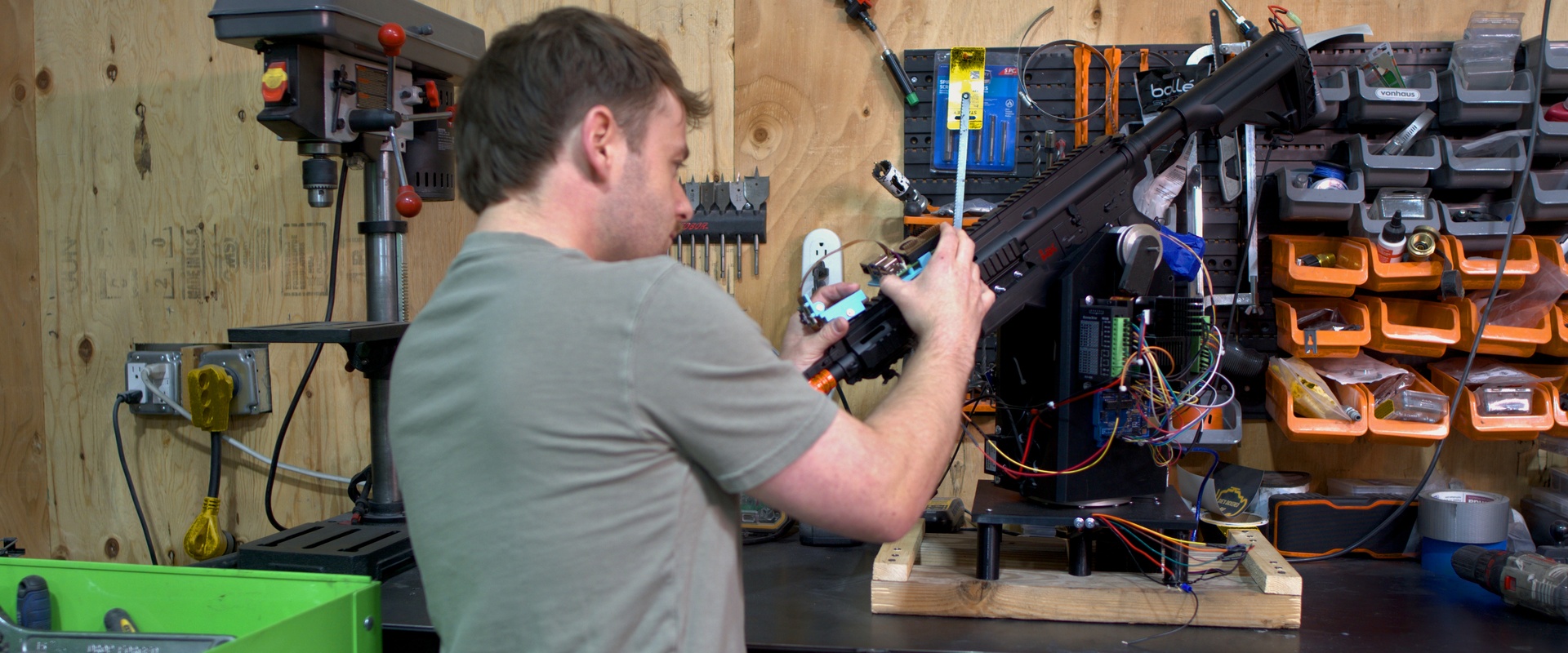 Corbin Probasco working on electronics in the shop